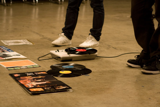 DJ Who Gave Too Much Information performance record player and feet